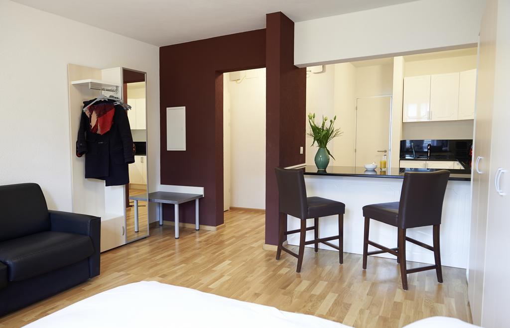 Residence Apartments By Hotel Du Commerce Базель Номер фото